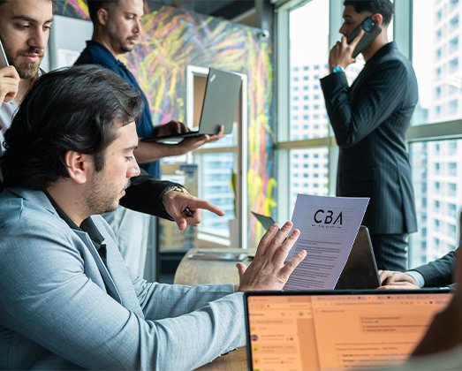 Professional real estate team discussing a project