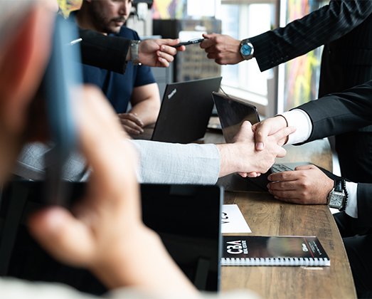 Professional real estate team discussing a project